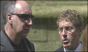 Pete Townshend and Roger Daltrey outside the church
